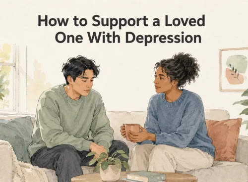 A supportive friend sits beside a loved one experiencing depression and offers a warm drink